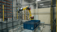 Projet de R&D « bin picking » chez Log’in : une cellule robotisée intégrant vision et intelligence artificielle pour automatiser le prélèvement de pièces dans les bacs, en conditions logistiques réelles - © Daher
