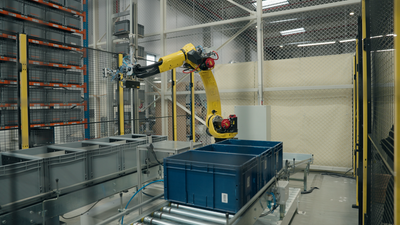 Projet de R&D « bin picking » chez Log’in : une cellule robotisée intégrant vision et intelligence artificielle pour automatiser le prélèvement de pièces dans les bacs, en conditions logistiques réelles - © Daher